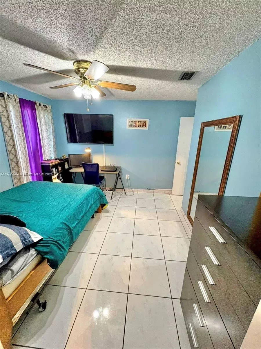 Bedroom - 11920 SW 132nd Ave, Miami, FL 33186 photo 2 of 14