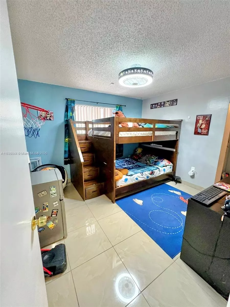 Bedroom - 11920 SW 132nd Ave, Miami, FL 33186 photo 7 of 14