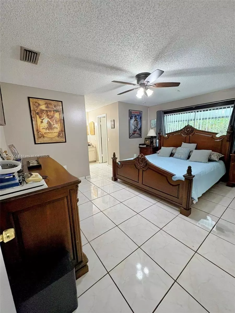 Bedroom - 11920 SW 132nd Ave, Miami, FL 33186 photo 12 of 14