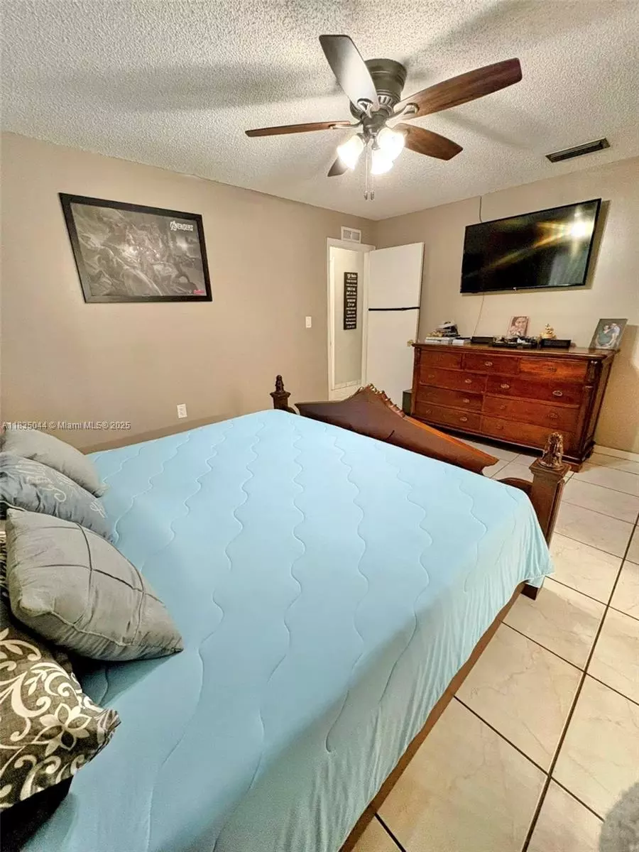Bedroom - 11920 SW 132nd Ave, Miami, FL 33186 photo 11 of 14