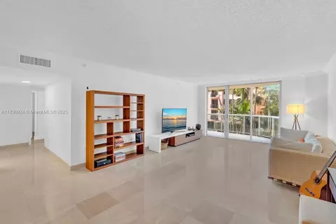Living - 8855 E Collins Ave #2F, Surfside, FL 33154 photo 5 of 6