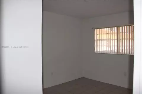 Bedroom - 1075 W 68th St #110, Hialeah, FL 33014 photo 2 of 3