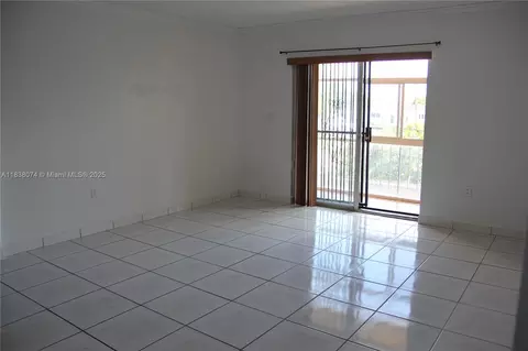 Living - 1075 W 68th St #110, Hialeah, FL 33014 photo 1 of 2