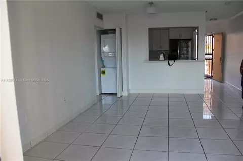 Living - 1075 W 68th St #110, Hialeah, FL 33014 photo 2 of 2