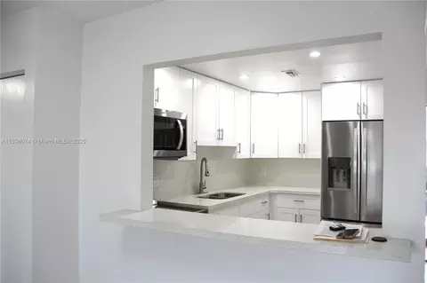 Kitchen - 1075 W 68th St #110, Hialeah, FL 33014 photo 3 of 3