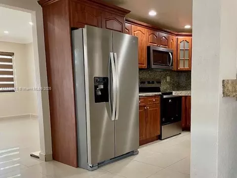 Kitchen - 330 W 40th Pl, Hialeah, FL 33012 photo 1 of 2