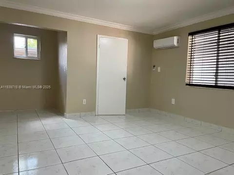 Living - 330 W 40th Pl, Hialeah, FL 33012 photo 4 of 5