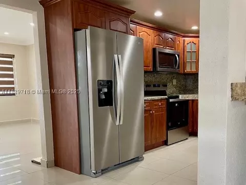 Kitchen - 330 W 40th Pl, Hialeah, FL 33012 photo 1 of 2