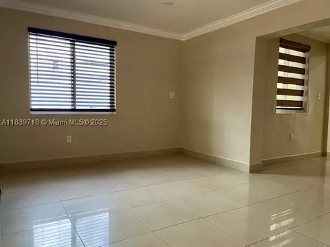 Living - 330 W 40th Pl, Hialeah, FL 33012 photo 3 of 5