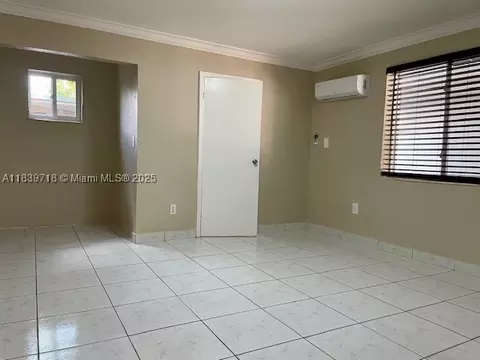 Living - 330 W 40th Pl, Hialeah, FL 33012 photo 4 of 5