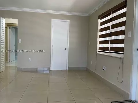 Living - 330 W 40th Pl, Hialeah, FL 33012 photo 2 of 5