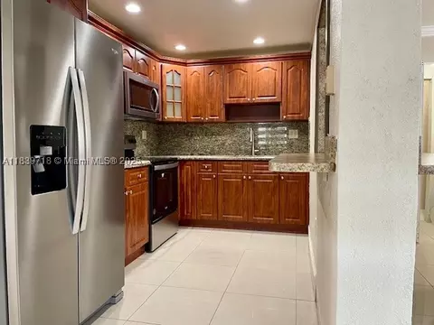 Kitchen - 330 W 40th Pl, Hialeah, FL 33012 photo 2 of 2