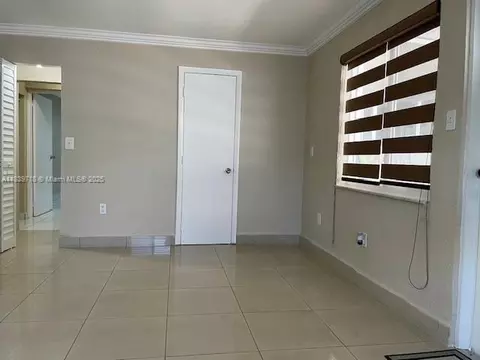 Living - 330 W 40th Pl, Hialeah, FL 33012 photo 2 of 5