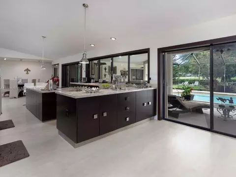 Kitchen - 1000 E Cypress Dr, Pompano Beach, FL 33069 photo 3 of 4