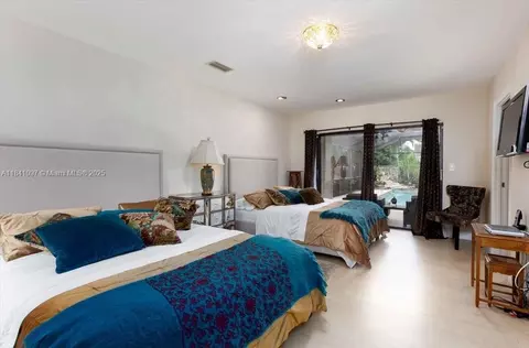 Bedroom - 1000 E Cypress Dr, Pompano Beach, FL 33069 photo 2 of 3