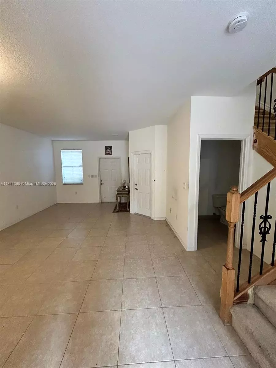 Living - 12170 SW 126, Miami, FL 33186 photo 3 of 3
