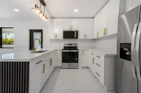 Kitchen - 301 W 30th St, Hialeah, FL 33012 photo 2 of 3