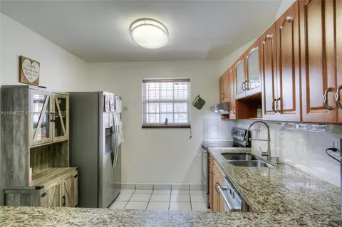 Kitchen - 834 W 80th Pl, Hialeah, FL 33014 photo 2 of 2