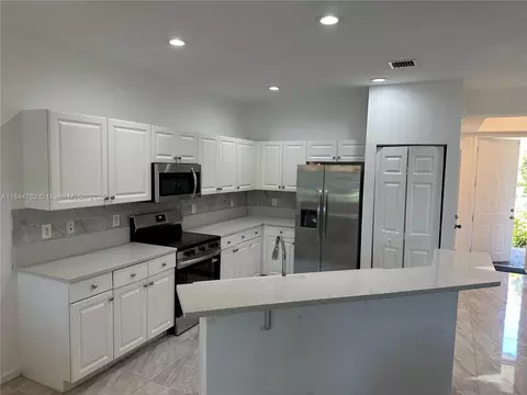 1990 Marsh Harbor Dr, Riviera Beach, FL 33404
