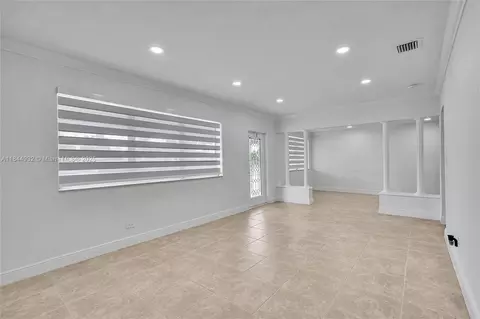 Living - 453 W 40th Pl, Hialeah, FL 33012 photo 3 of 9
