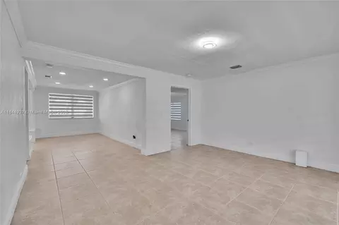 Living - 453 W 40th Pl, Hialeah, FL 33012 photo 7 of 9