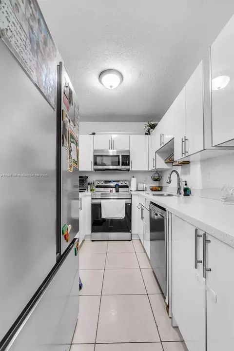 Kitchen - 740 E 41st St, Hialeah, FL 33013 photo 2 of 3