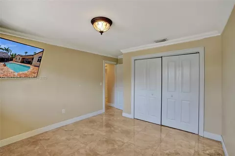 Bedroom - 7135 N Augusta Dr, Hialeah, FL 33015 photo 7 of 10