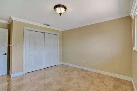 Bedroom - 7135 N Augusta Dr, Hialeah, FL 33015 photo 6 of 10