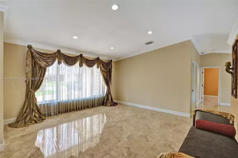 Living - 7135 N Augusta Dr, Hialeah, FL 33015 photo 1 of 11