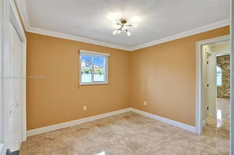 Bedroom - 7135 N Augusta Dr, Hialeah, FL 33015 photo 9 of 10