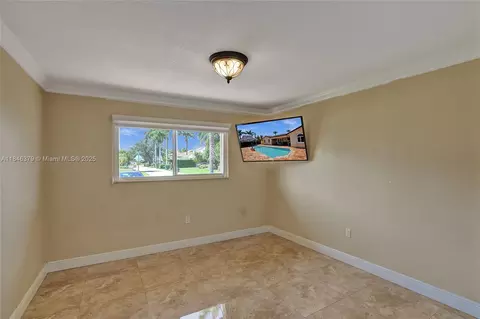 Bedroom - 7135 N Augusta Dr, Hialeah, FL 33015 photo 8 of 10
