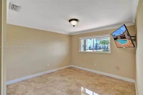 Bedroom - 7135 N Augusta Dr, Hialeah, FL 33015 photo 5 of 10