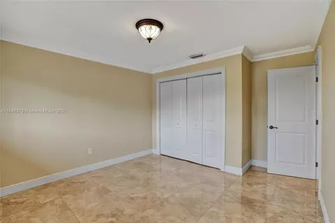 Bedroom - 7135 N Augusta Dr, Hialeah, FL 33015 photo 4 of 10