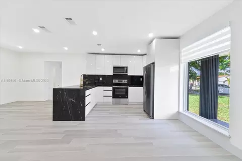 Kitchen - 1026 W 32nd St, Hialeah, FL 33012 photo 2 of 2
