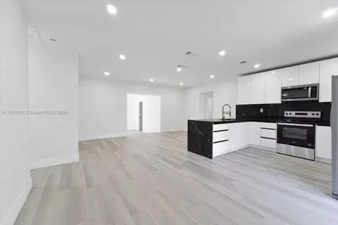 Living - 1026 W 32nd St, Hialeah, FL 33012 photo 3 of 3
