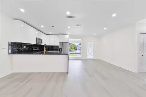 Living - 1026 W 32nd St, Hialeah, FL 33012 photo 2 of 3