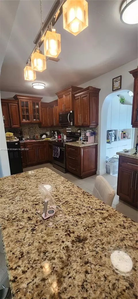 Kitchen - 802 E 30th St, Hialeah, FL 33013 photo 1 of 2