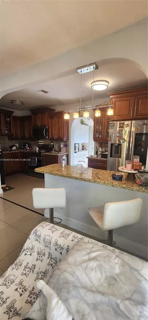 Kitchen - 802 E 30th St, Hialeah, FL 33013 photo 2 of 2