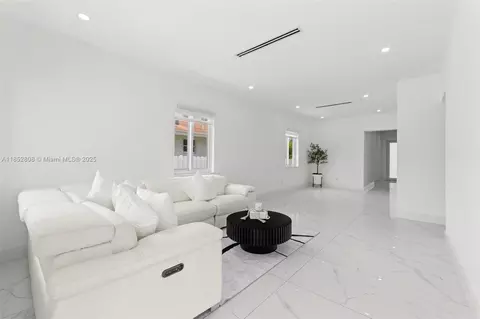 Living - 4205 E 10th Ave, Hialeah, FL 33013 photo 1 of 2