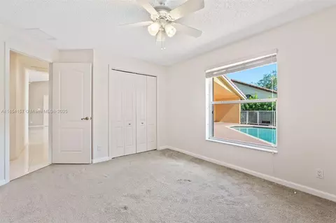 Bedroom - 4635 NW 99th Ln, Coral Springs, FL 33076 photo 6 of 7