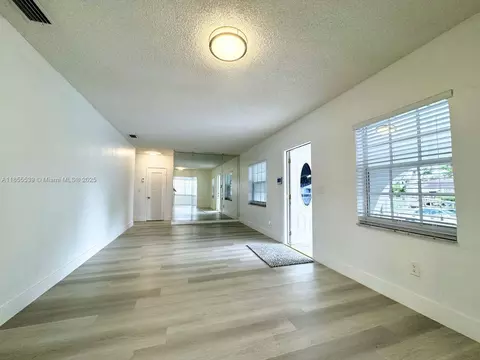 Living - 115 W 37th St, Hialeah, FL 33012 photo 2 of 4