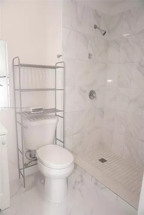 Bath - 4851 E 8th Ct, Hialeah, FL 33013 photo 3 of 4