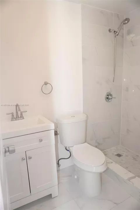 Bath - 4851 E 8th Ct, Hialeah, FL 33013 photo 2 of 4