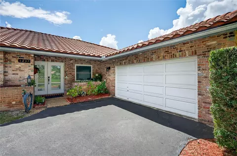 Exterior - 1237 NW 110th Ter, Coral Springs, FL 33071 photo 2 of 4