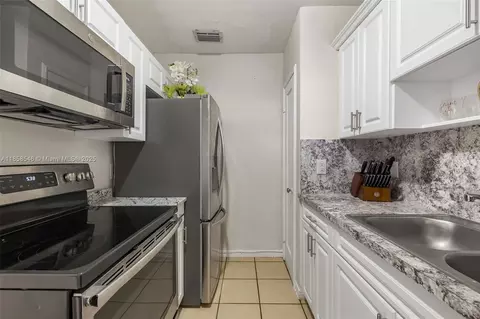 Kitchen - 620 NE 2nd Pl, Hialeah, FL 33010 photo 2 of 3
