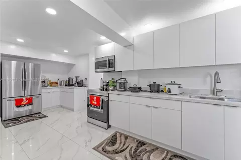 Kitchen - 730 Curtiss Dr, Opa Locka, FL 33054 photo 1 of 4