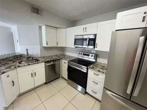 8821 Wiles Rd #203, Coral Springs, FL 33067