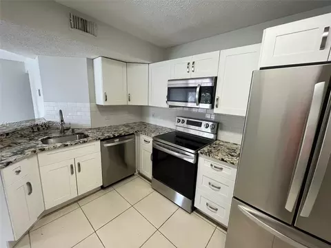 8821 Wiles Rd #203, Coral Springs, FL 33067