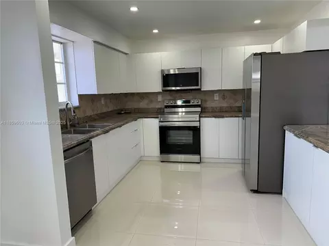 Kitchen - 620 W 70th Pl, Hialeah, FL 33014 photo 1 of 2