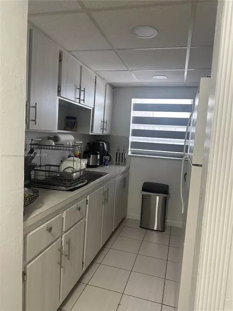 Kitchen - 1335 W 68th St #308, Hialeah, FL 33014 photo 2 of 2